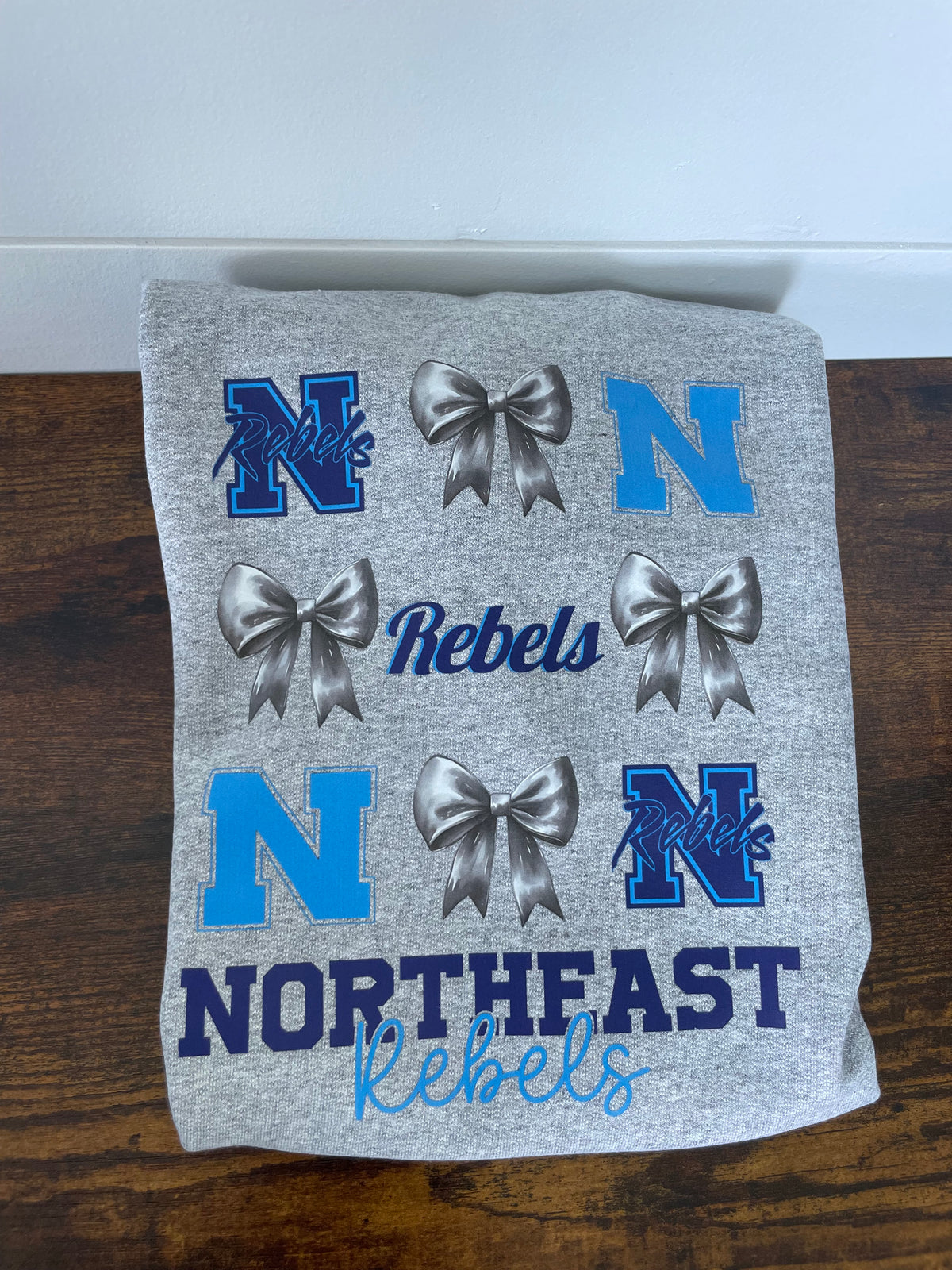 Northeast rebels bow youth crewneck