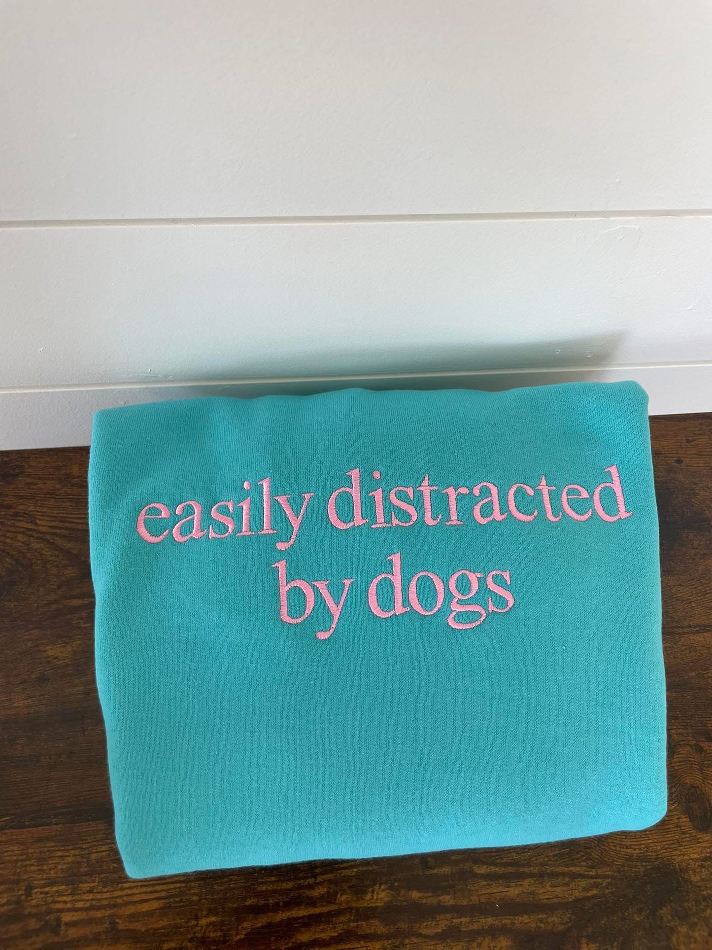 Easily distracted by dogs embroidered crewneck