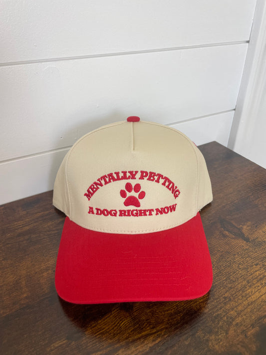 Mentally petting a dog red hat