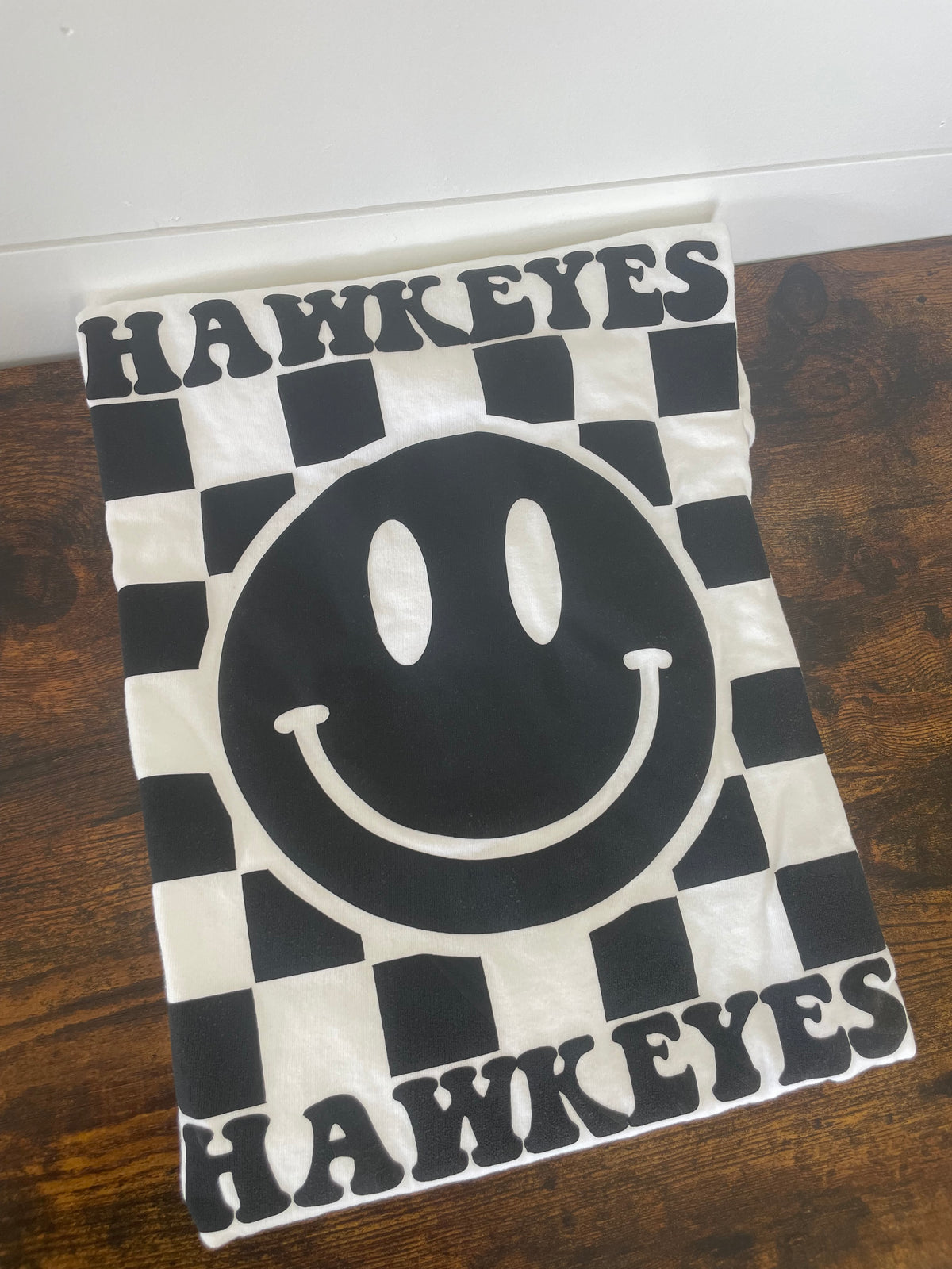 White Hawkeyes Puff Print Checkered Happy Face Shirt