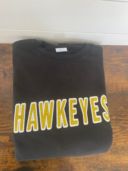 Black Hawkeyes Glitter Angled Crewneck