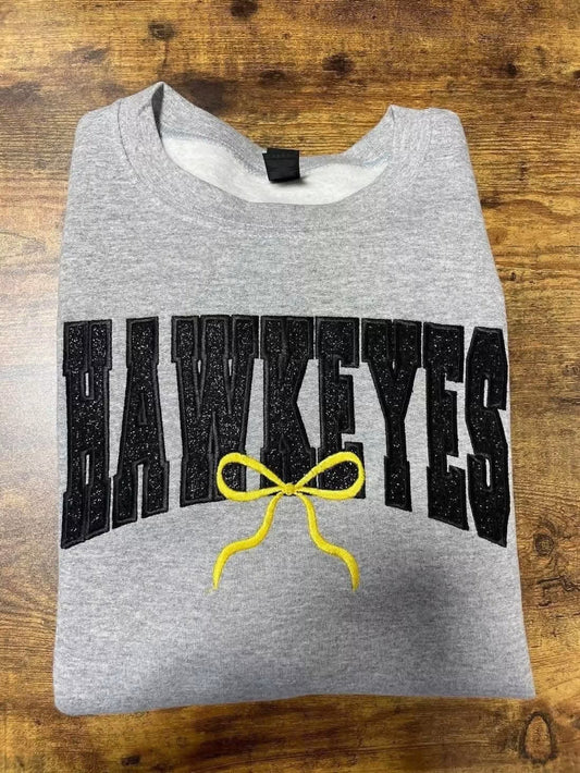 Hawkeyes Bow Glitter Embroidered Crewneck