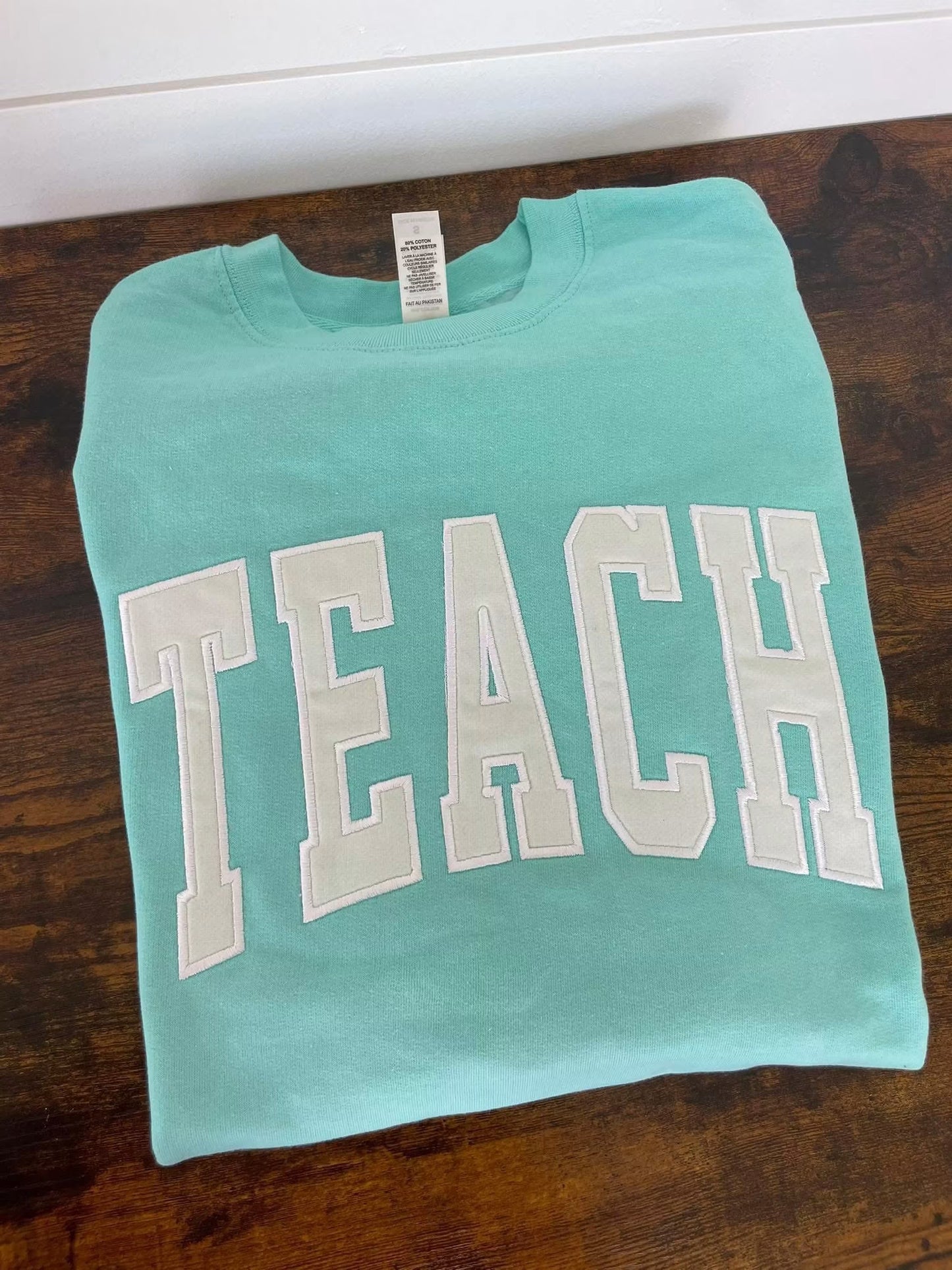 Teach Embroidered Crewneck